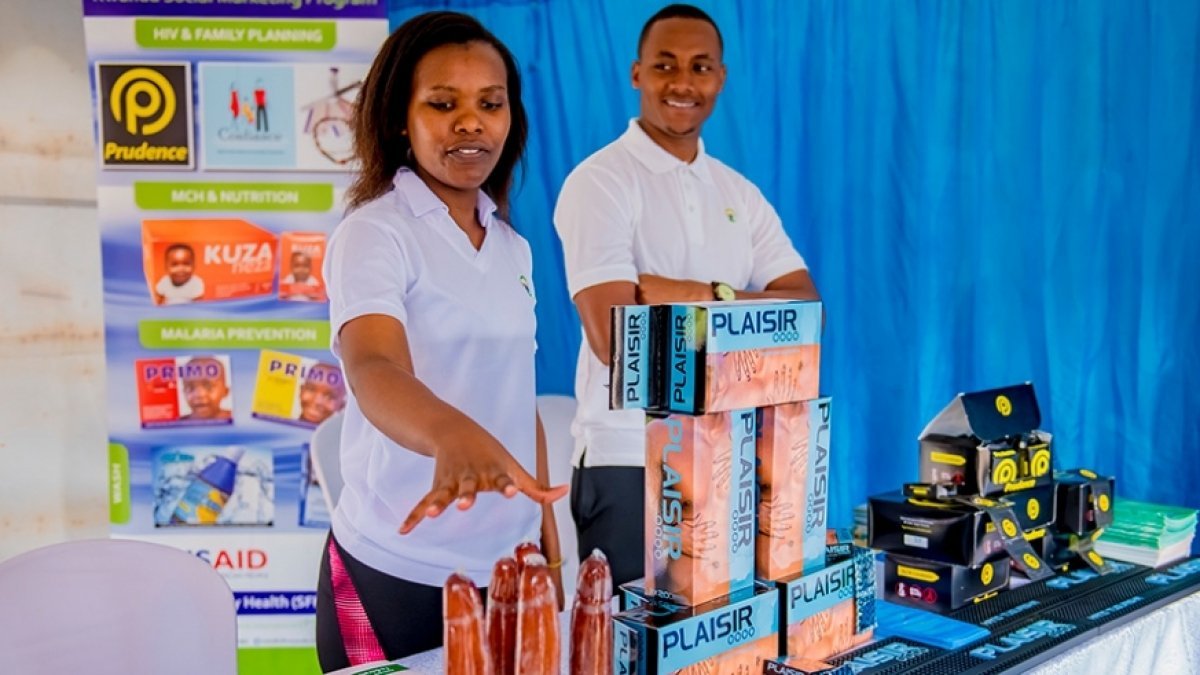 What is holding back the fight against HIV/AIDS?